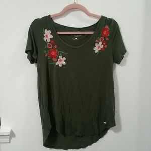 Green Hollister shirt with embroidery flowers.